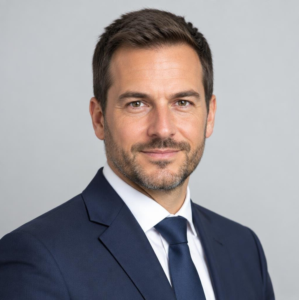 Studio portrait of a Belgian businessman in a suit